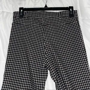 Black and white pants with belt loop and zipper